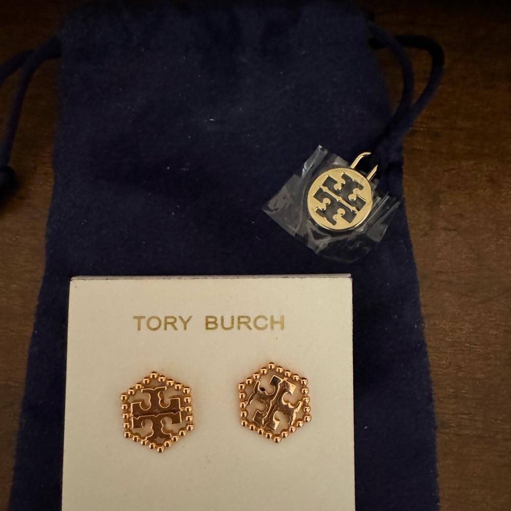 Rose gold Tory Burch earrings with dust bag.